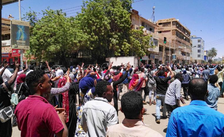 Sudanese protesters chant slogans during an anti-government demonstration in the capital Khartoum on April 6, 2019.