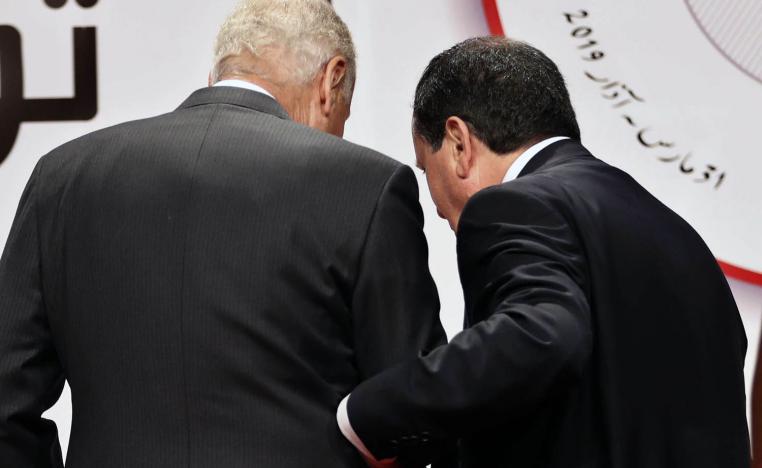 وزير الخارجية التونسي خميس الجهيناوي وأمين عام الجامعة العربية أحمد أبوالغيط في نهاية مؤتمر صحفي أعقب اختتام قمة تونس