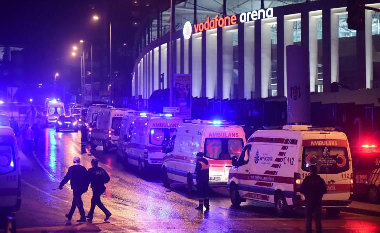 Ambulances are seen near the stadium of Besiktas in central Istanbul on December 10, 2016
