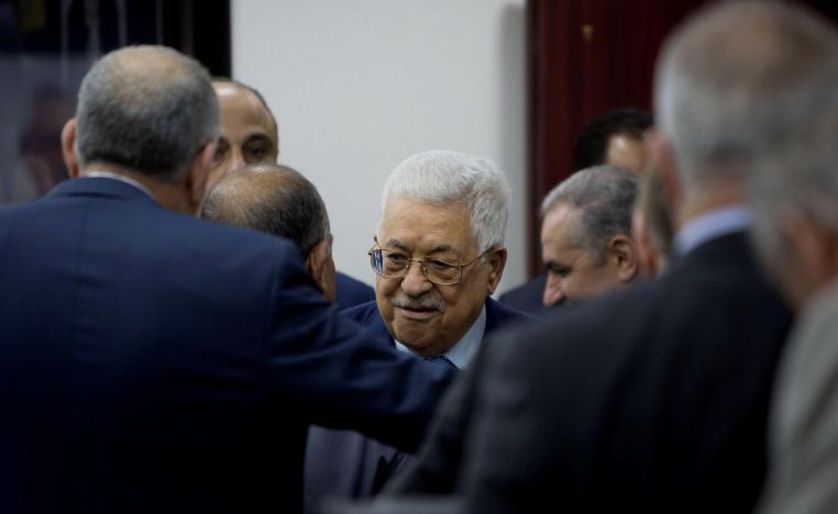 Palestinian President Mahmoud Abbas arrives for a session of the weekly cabinet meeting in Ramallah