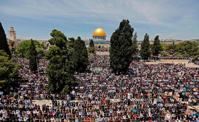 Palestinian Muslim worshippers pray in the al-Aqsa Mosque compound