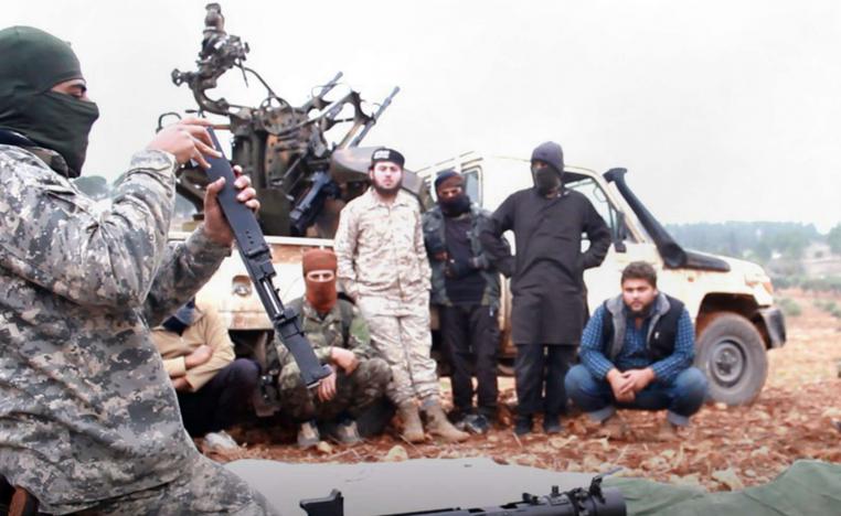 Photo shows al-Qaeda-linked militants learning how to use a heavy weapon in the countryside of Idlib