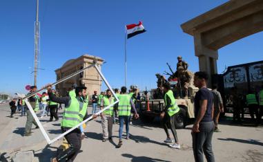 Iraqis protest near the provincial council building in Basra, last March