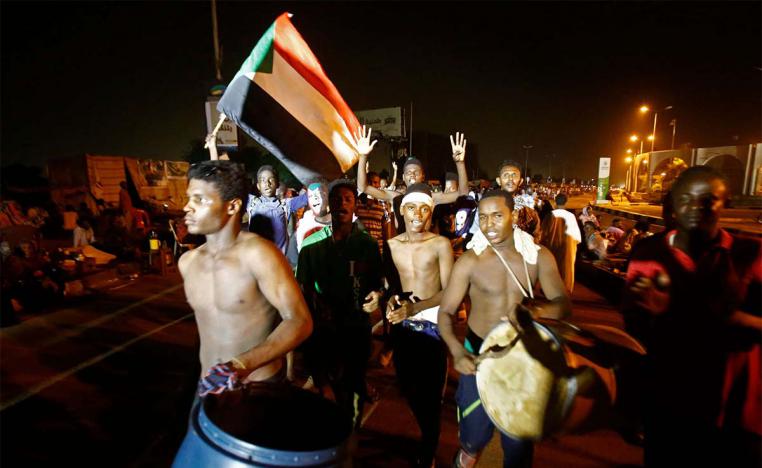 Sudanese gather during demonstration outside the army headquarters in Khartoum 