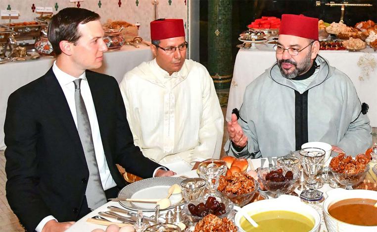 Moroccan King Mohammed VI (R) sharing an Iftar meal with Senior Advisor to US President Jared Kushner (L) at the Royal Residence in Rabat