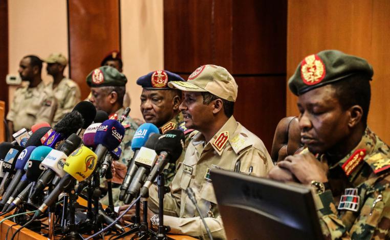 Gen. Mohamed Hamdan Dagalo, the deputy head of the military council, second right, speaks at a press conference in Khartoum