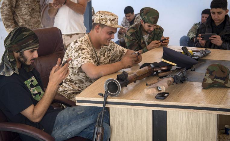 Fighters loyal to the internationally-recognised GNA play online video game PlayerUnknown's Battlegrounds