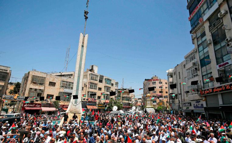Palestinian demonstrators attend a rally marking the Nakba in Ramallah