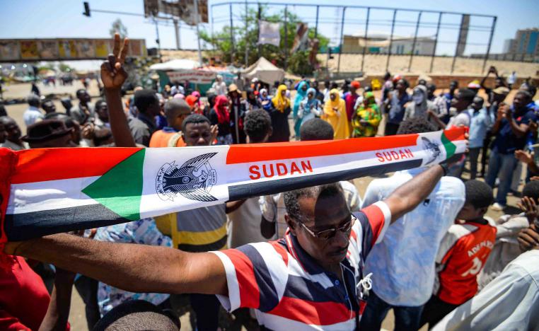 The deadly violence in and around the sit-in broke out just hours after the two sides announced they had reached agreement