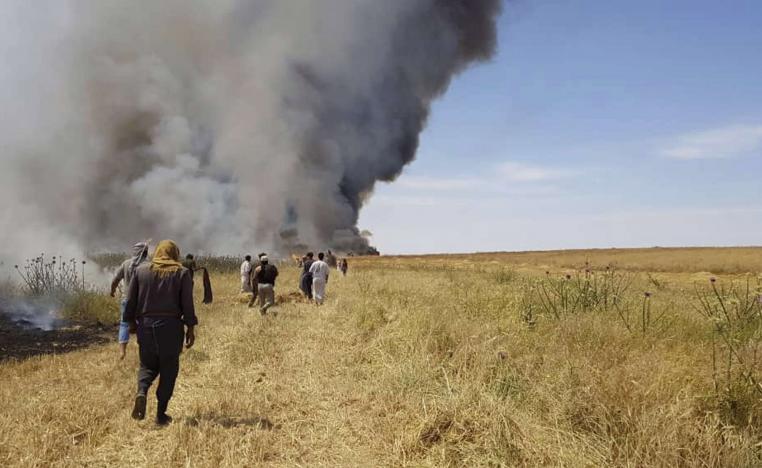 نحو 700 عائلة نزحت باتجاه الموصل بعد أن وصلت الحرائق إلى منازلهم