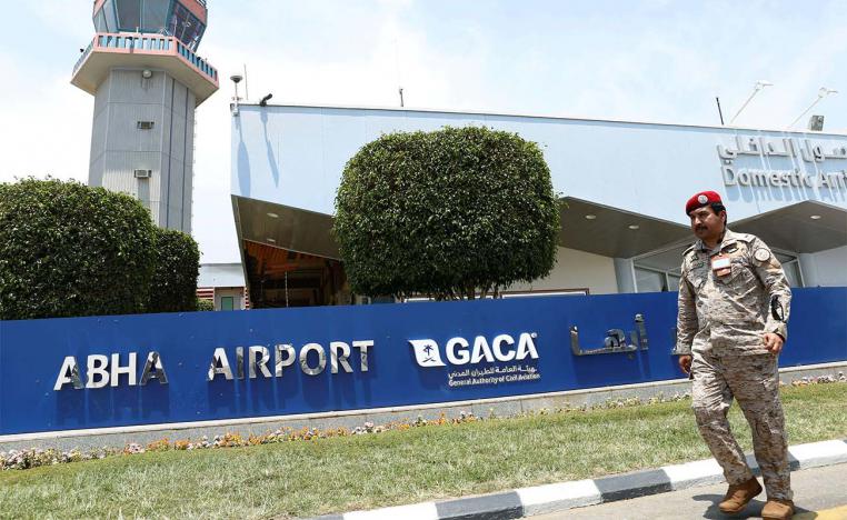 A Saudi security officer walks past the Saudi Arabia's Abha airport