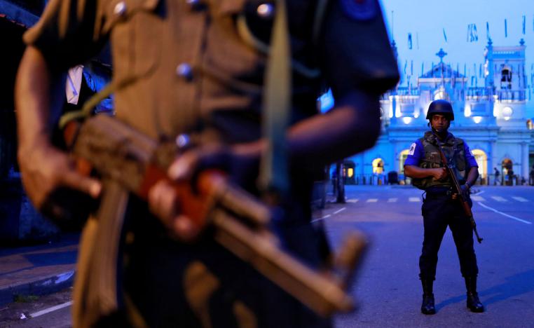 Security personnel stand guard in front of St Anthony's Shrine in Colombo, Sri Lanka