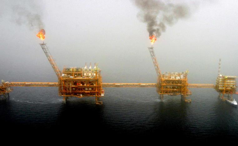 as flares from an oil production platform at the Soroush oilfields in the Gulf