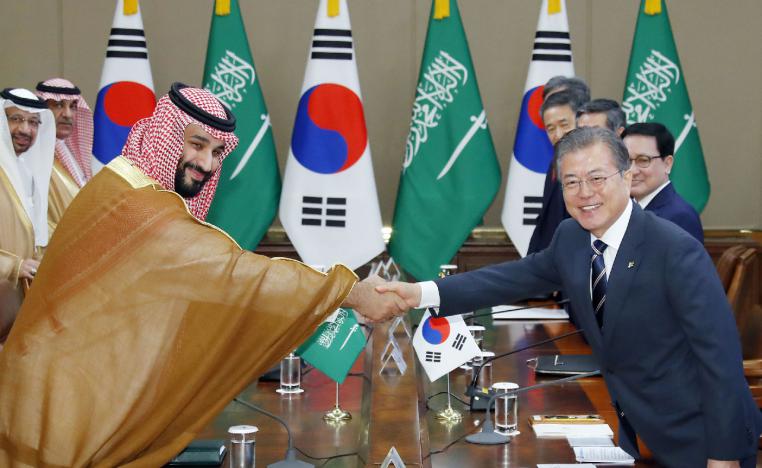 South Korean President Moon Jae In shakes hands with Mohammed bin Salman