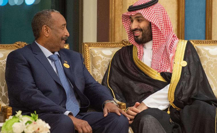 Crown Prince Mohammed bin Salman (R) of Saudi Arabia talking to General Abdel Fattah al-Burhan, head of Sudan's ruling Transitional Military Council