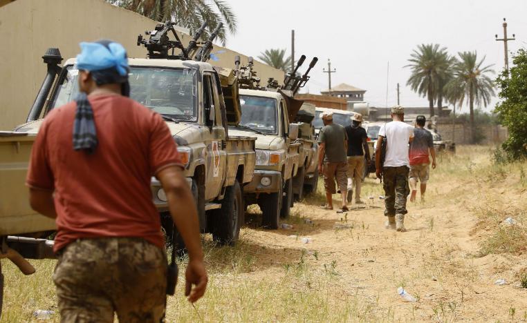 Fighters loyal to the GNA hold a position in the al-Sawani area south of Tripoli