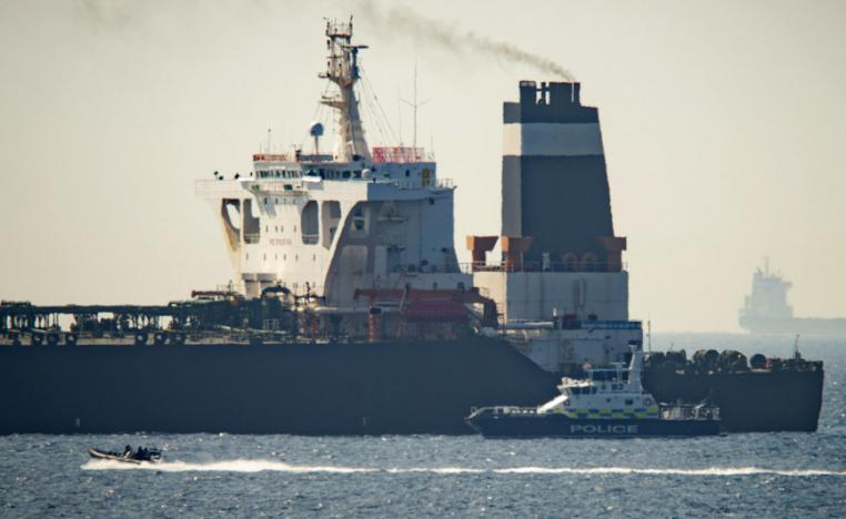 Royal Marine patrol vessel is seen beside the Grace 1 super tanker in the British territory of Gibraltar