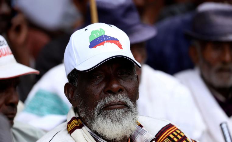 A Sidama elder wears a cap with an imprinted Sidama region flag