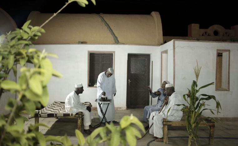 Nubian men talk at a home in Wadi Karkar in the desert west of Lake Nasser