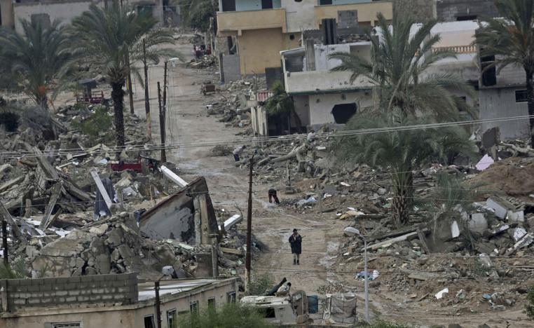 Egyptian army forces patrol amid the debris of houses destroyed by the army in the town of Rafah