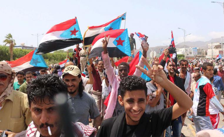 STC supporters wave flags of the former South Yemen 