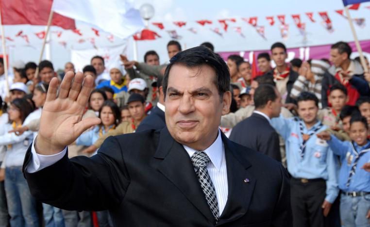 Zine El Abidine Ben Ali waves to supporters in Rades before celebrations marking the 20th anniversary of his presidency on Nov. 7, 2007