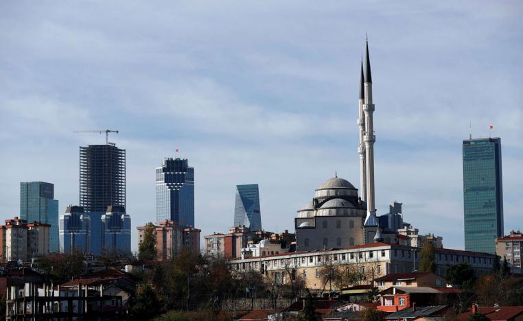  Business and financial district of Levent, which comprises of leading Turkish banks' and companies' headquarters, is seen behind a residential neighborhood in Istanbul
