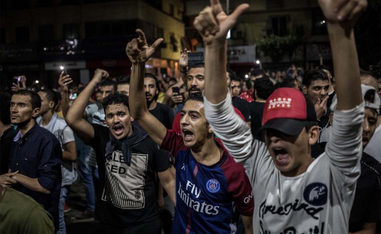 Protesters shout slogans during a rare anti-government protest in Downtown Cairo