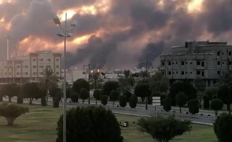 Smoke is seen following a fire at an Aramco factory in Abqaiq