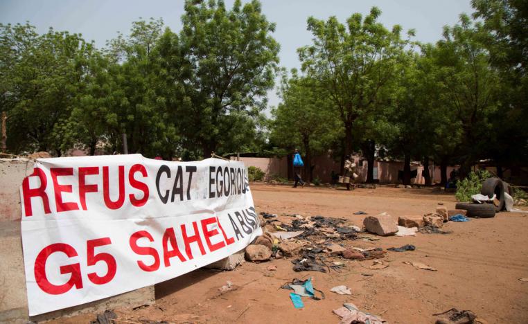 Tires block the road on May 23, 2019 in front of the new headquarters of the G5 Sahel