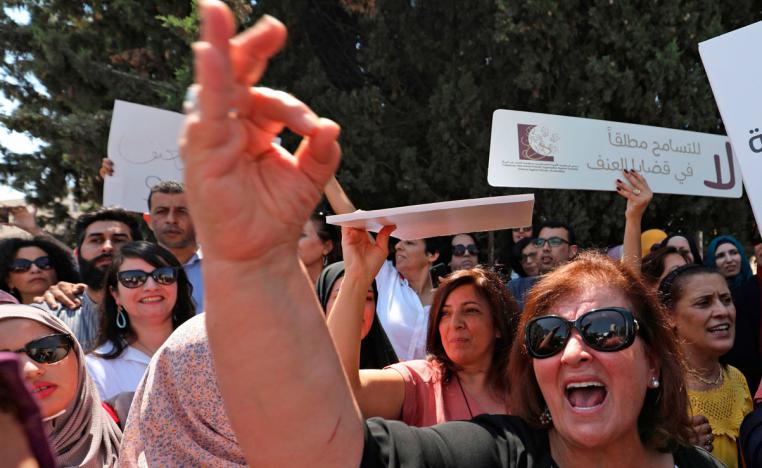Palestinian women protest in support of women's rights outside the prime minister's office in Ramallah