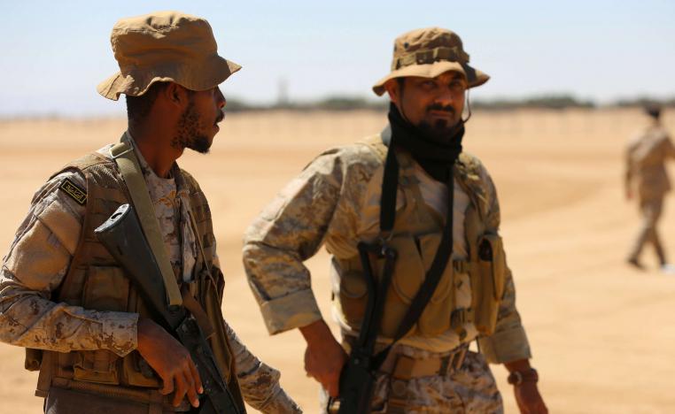 Saudi soldiers stand guard in Yemen's central province of Marib