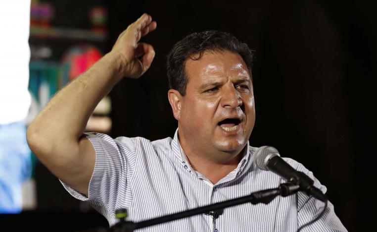 The head of the mainly Arab Joint List alliance Ayman Odeh speaks during an electoral campaign rally