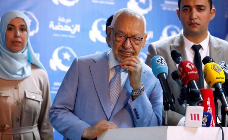 Rached Ghannouchi, leader of Tunisia's moderate Islamist Ennahda Party attends a news conference in Tunis