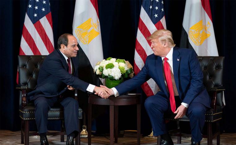 US President Donald Trump shakes hands with Egyptian President Abdel Fattah el-Sisi during their meeting
