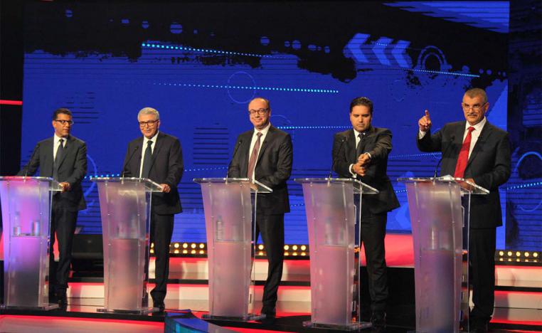 Tunisia's presidential candidates attending the second round of the presidential debate last week