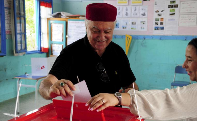 Sunday's vote for parliament is sandwiched between two rounds of a presidential election