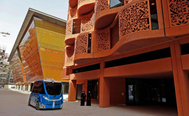 A driverless vehicle in a street at the site of Masdar City, a planned sustainable city project in Abu Dhabi