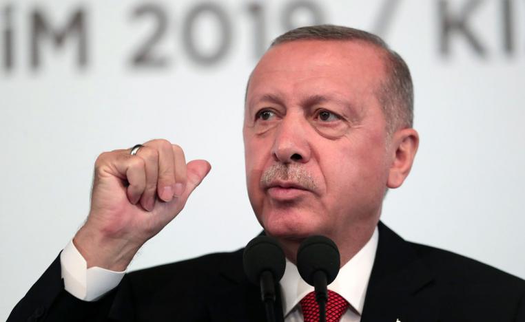 Turkey's President Recep Tayyip Erdogan talks to to supporters during an event in Ankara