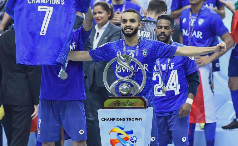  لاعب الهلال محمد البريك يحتفل بفوز فريقه في مباراة الإياب الثانية من دوري أبطال آسيا لكرة القدم بين أوراوا ريدز والهلال