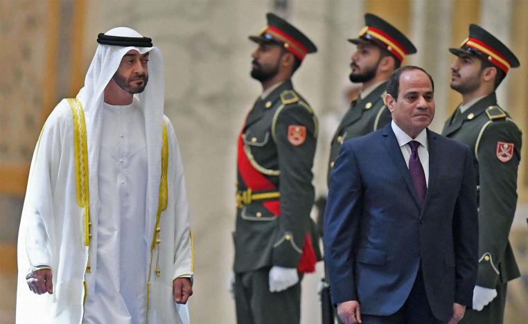 Egyptian President Abdel Fattah al-Sisi and the Crown Prince of Abu Dhabi, Sheikh Mohamed bin Zayed al-Nahyan, attend a welcome ceremony in Al-Watan presidential palace in Abu Dhabi