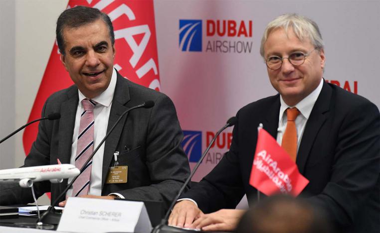 Adel Ali (L), CEO of Air Arabia, and Christian Scherer, Chief Commercial Officer (CCO) at Airbus at Dubai Airshow