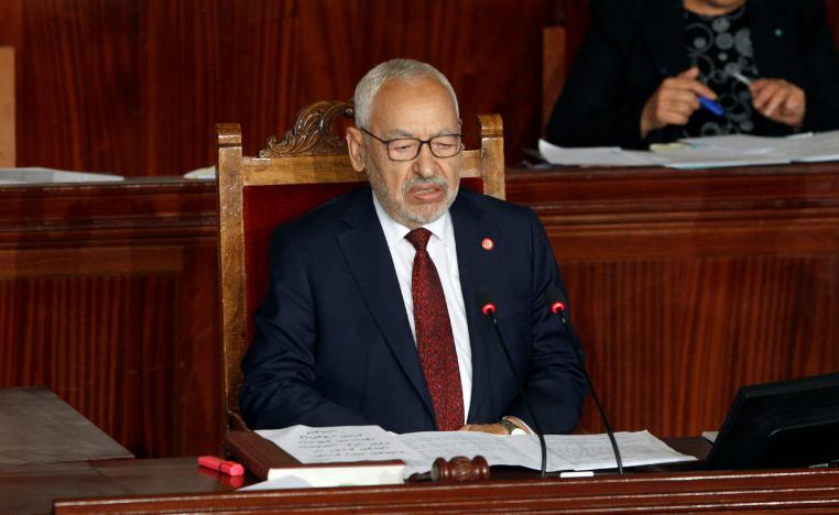 Rached Ghannouchi attends the parliament's opening with a session to elect a speaker