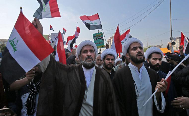 Supporters of the Hashed al-Shaabi armed network demonstrate in the capital Baghdad's Tahrir Square
