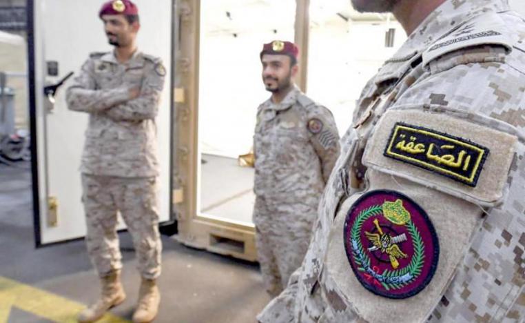 Members of the Saudi special forces stand aboard Britain’s RFA Cardigan Bay landing ship in the Gulf waters off Bahrain.