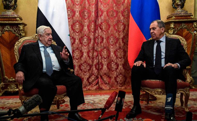 Russian Foreign Minister Sergey Lavrov (R) and his Syrian counterpart Walid Muallem
