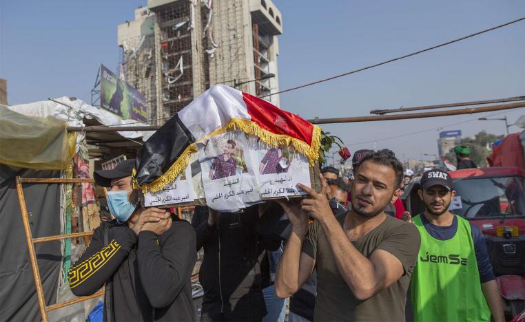 Mourners carry the body of a fellow protester 