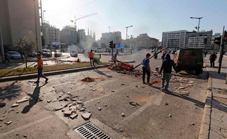 Lebanese anti-government protesters set up a roadblock in the downtown area of the capital Beirut