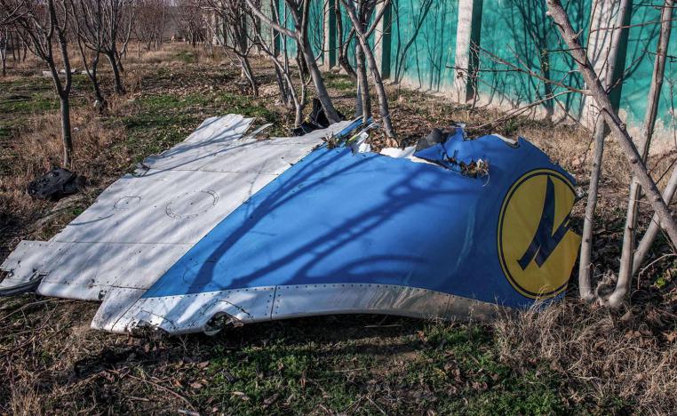 A piece of airplane fuselage at the scene, where a Ukrainian airplane carrying 176 people crashed