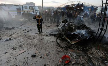 The suicide attacks were carried out by jihadist group Hayat Tahrir al-Sham 